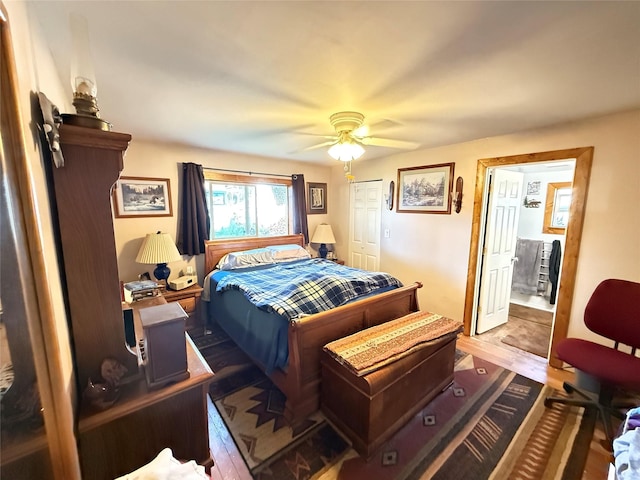 306 E Missoula Ave, Troy, MT 59935 - bedroom with wood finished floors and a ceiling fan