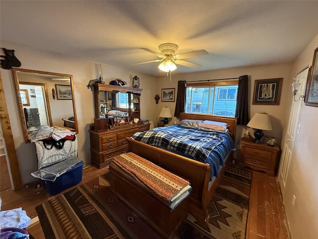 306 E Missoula Ave, Troy, MT 59935 - bedroom featuring wood finished floors and ceiling fan