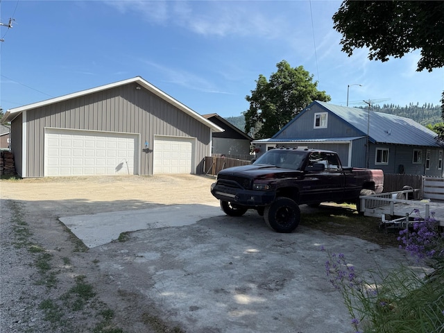 306 E Missoula Ave, Troy, MT 59935 - view of side of property featuring a detached garage
