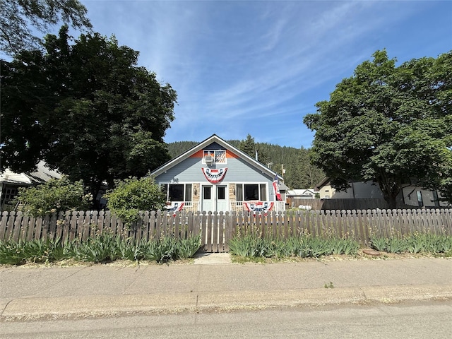 306 E Missoula Ave, Troy, MT 59935 - bungalow featuring a fenced front yard