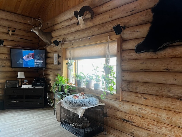 223 E G St, Sula, MT 59871 - living room featuring rustic walls, wood finished floors, and wooden ceiling
