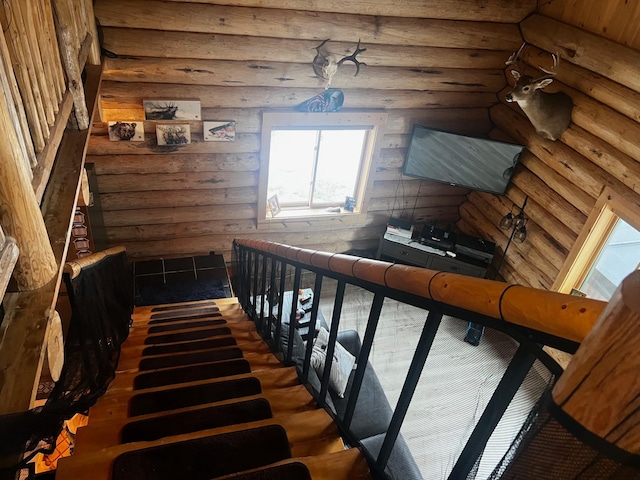 223 E G St, Sula, MT 59871 - stairway featuring rustic walls and wood finished floors