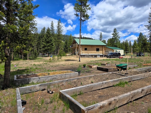 223 E G St, Sula, MT 59871 - view of yard featuring a garden