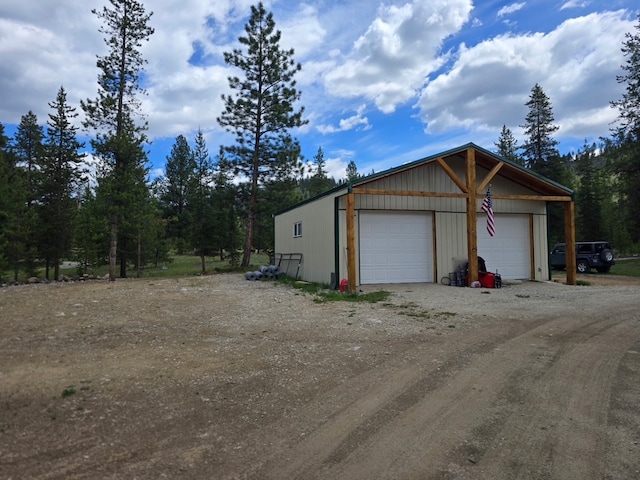 223 E G St, Sula, MT 59871 - detached garage featuring dirt driveway