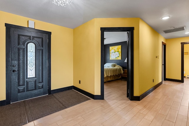2813 Pine Lakes Ct, Stevensville, MT 59870 - entryway with light wood finished floors and recessed lighting