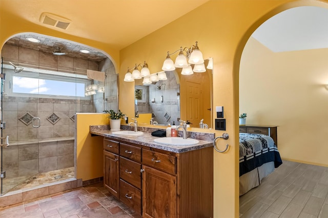 2813 Pine Lakes Ct, Stevensville, MT 59870 - full bath featuring double vanity, a stall shower, and ensuite bath