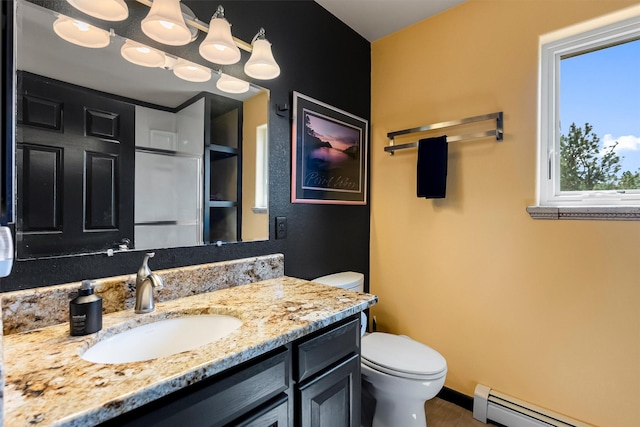 2813 Pine Lakes Ct, Stevensville, MT 59870 - bathroom featuring baseboard heating and vanity