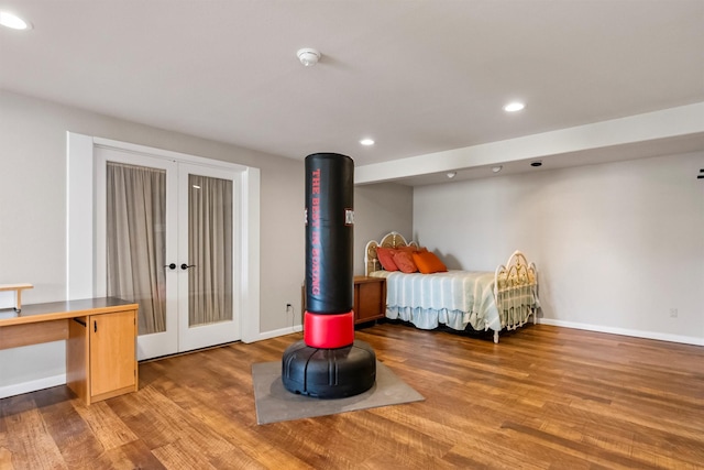 2813 Pine Lakes Ct, Stevensville, MT 59870 - bedroom featuring french doors, wood finished floors, and recessed lighting