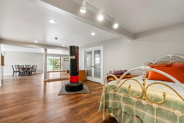 2813 Pine Lakes Ct, Stevensville, MT 59870 - bedroom featuring wood finished floors, french doors, and recessed lighting