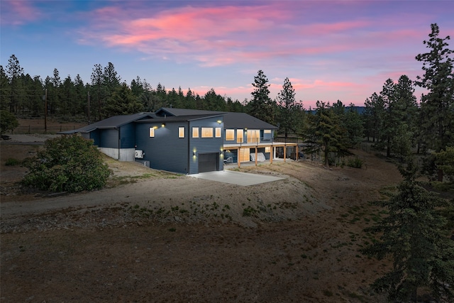 2813 Pine Lakes Ct, Stevensville, MT 59870 - modern home with driveway and an attached garage