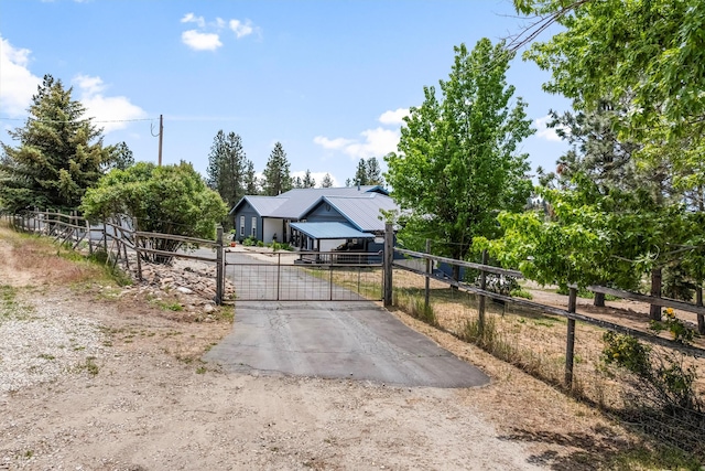 2813 Pine Lakes Ct, Stevensville, MT 59870 - view of front of home with a gate and asphalt driveway
