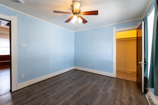 1805 2nd Ave N, Great Falls, MT 59401 - unfurnished bedroom featuring crown molding, dark wood-type flooring, and a ceiling fan