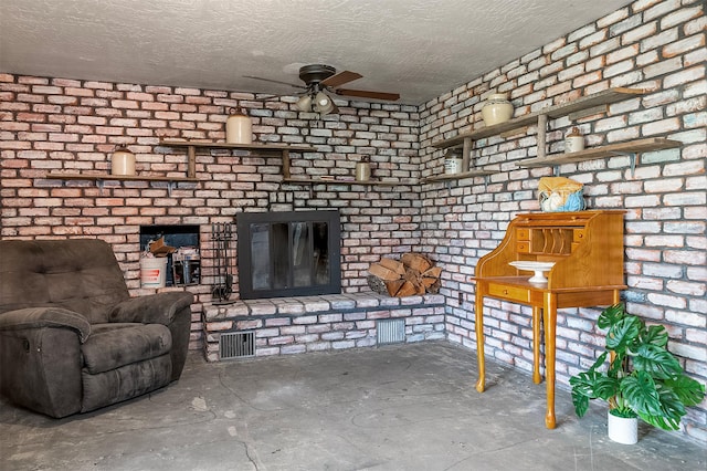 30543 Walking Horse Ln, Big Arm, MT 59910 - kitchen with under cabinet range hood, electric range, freestanding refrigerator, light countertops, and fridge