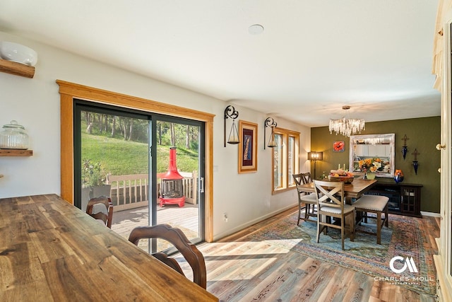 2623 Gold Rush Ave, Helena, MT 59601 - dining room featuring wood finished floors and a chandelier