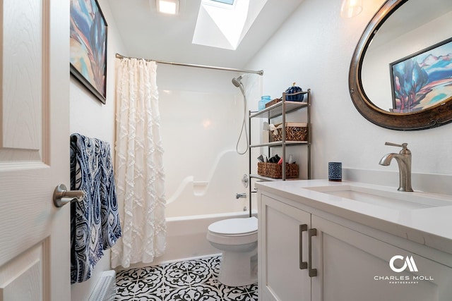 2623 Gold Rush Ave, Helena, MT 59601 - full bath featuring a skylight, vanity, shower / bath combo with shower curtain, and tile patterned floors