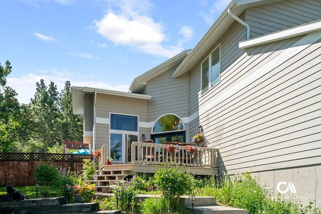 2623 Gold Rush Ave, Helena, MT 59601 - rear view of property with a wooden deck