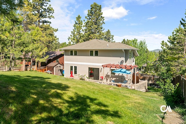 2623 Gold Rush Ave, Helena, MT 59601 - back of house with a storage shed, a fenced backyard, and a pergola