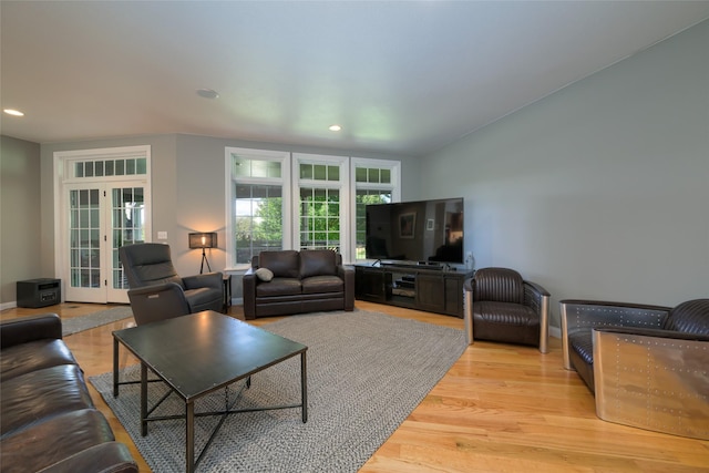 8785 Jacot Ln, Missoula, MT 59808 - living room featuring french doors, recessed lighting, and light wood-style flooring
