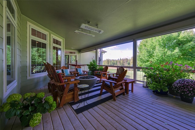 8785 Jacot Ln, Missoula, MT 59808 - wooden deck featuring a fire pit