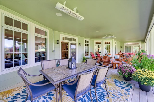 8785 Jacot Ln, Missoula, MT 59808 - wooden terrace featuring outdoor dining area