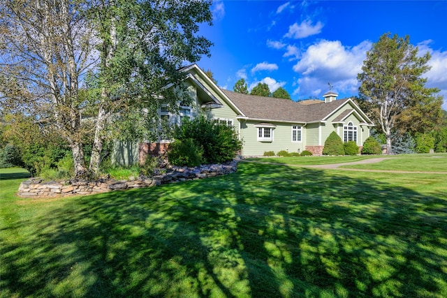 8785 Jacot Ln, Missoula, MT 59808 - view of front of property featuring brick siding and a front lawn