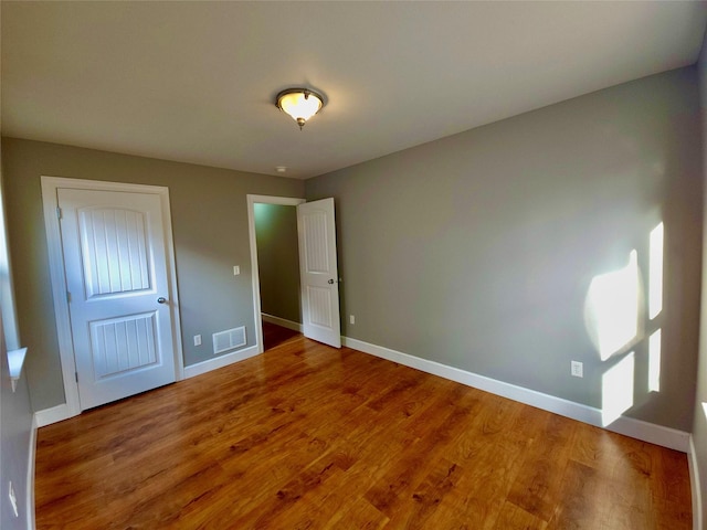 1109 Wyoming St, Belgrade, MT 59714 - unfurnished bedroom featuring wood finished floors