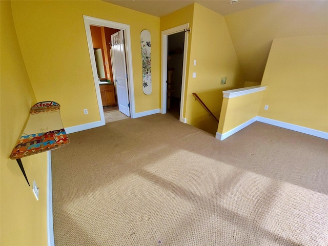 1109 Wyoming St, Belgrade, MT 59714 - additional living space with baseboards and light carpet