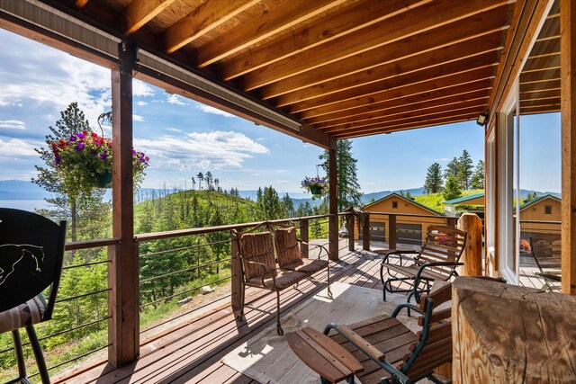 298 Lone Wolf Trl, Lakeside, MT 59922 - wooden terrace with an outdoor structure