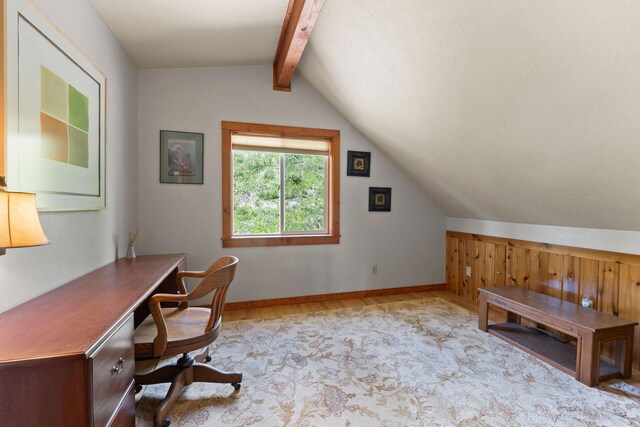 298 Lone Wolf Trl, Lakeside, MT 59922 - carpeted home office with wooden walls