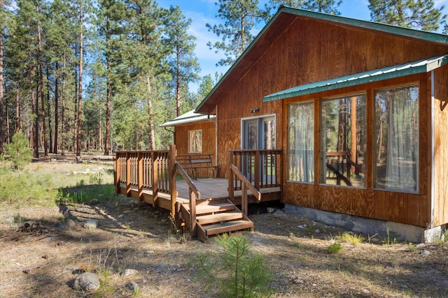 452 Blair Ln, Victor, MT 59875 - view of home's exterior featuring a deck and a metal roof
