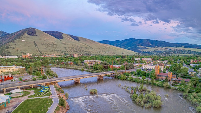 265 S 4th St E Unit 405, Missoula, MT 59801 - view of mountain backdrop with a notable bridge and a nearby body of water