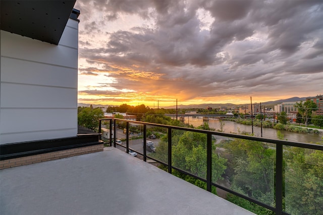265 S 4th St E Unit 405, Missoula, MT 59801 - balcony at dusk with a water view