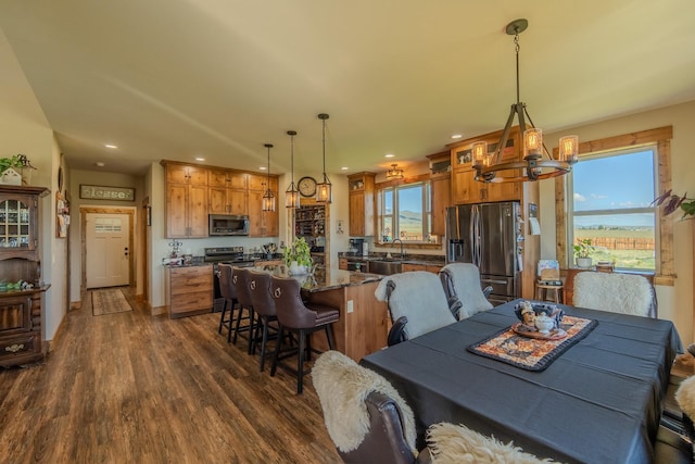 51 Whitehorse Rd, Townsend, MT 59644 - dining room with dark wood finished floors, a chandelier, and recessed lighting