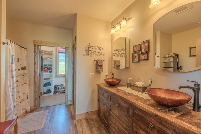 51 Whitehorse Rd, Townsend, MT 59644 - full bath featuring wood finished floors and double vanity