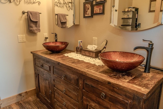 51 Whitehorse Rd, Townsend, MT 59644 - full bath with double vanity and wood finished floors