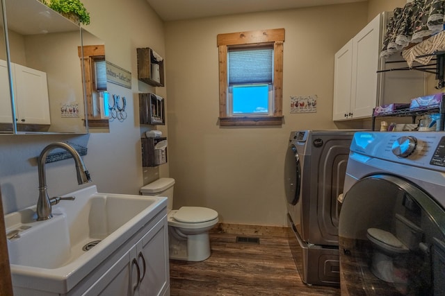 51 Whitehorse Rd, Townsend, MT 59644 - laundry area featuring separate washer and dryer and dark wood-style floors