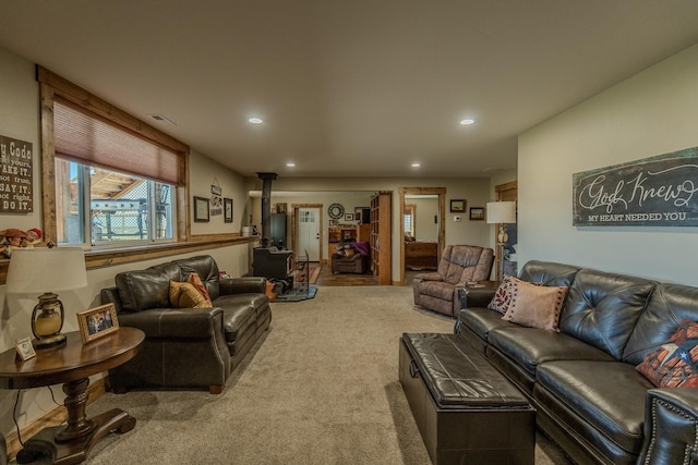 51 Whitehorse Rd, Townsend, MT 59644 - living area featuring a wood stove, recessed lighting, and carpet floors