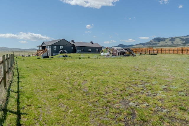 51 Whitehorse Rd, Townsend, MT 59644 - view of yard with a rural view, a mountain view, and stairs