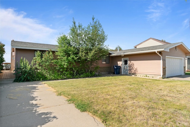 918 36th Ave NE, Great Falls, MT 59404 - view of front of home with a garage and a front lawn