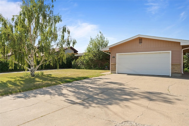 918 36th Ave NE, Great Falls, MT 59404 - view of front of house with a garage and a front lawn