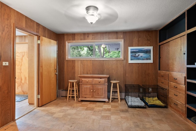 1700 Arthur Ave, Missoula, MT 59801 - sitting room with ceiling fan, light flooring, and wood walls