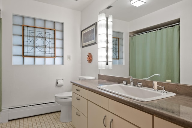 1700 Arthur Ave, Missoula, MT 59801 - full bathroom with a baseboard heating unit, vanity, tile patterned flooring, and curtained shower