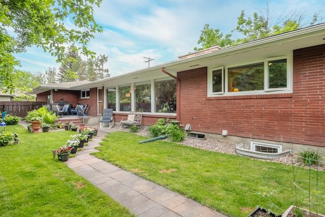 1700 Arthur Ave, Missoula, MT 59801 - rear view of property with brick siding and a patio area