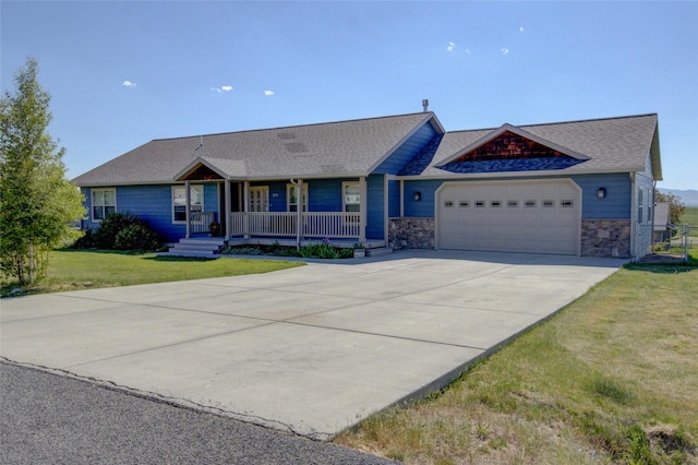 3250 Stillwell Dr, Helena, MT 59602 - ranch-style home featuring a porch, a garage, driveway, a front lawn, and roof with shingles