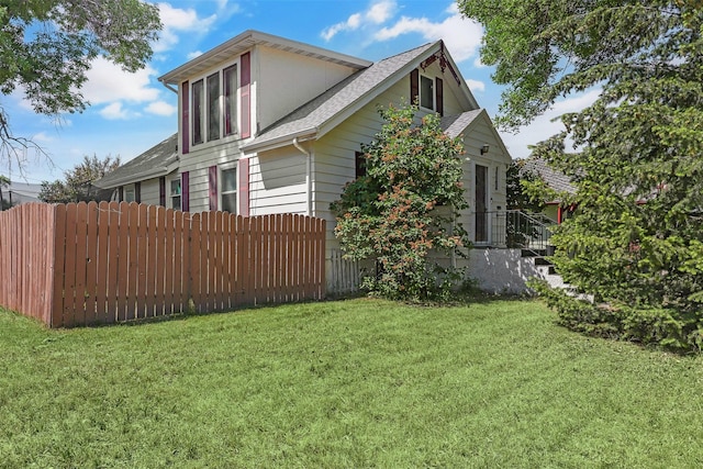 1126 4th Ave S, Great Falls, MT 59405 - view of side of home with a shingled roof