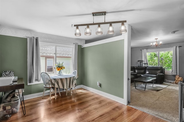 1126 4th Ave S, Great Falls, MT 59405 - dining area featuring a chandelier and wood finished floors