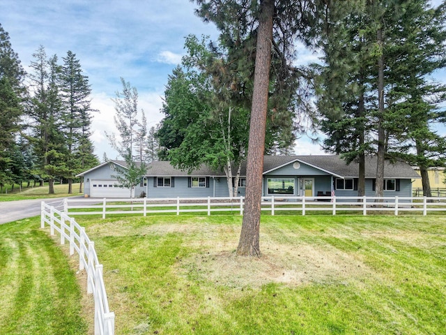791 Springwood Ln, Kalispell, MT 59901 - ranch-style home with driveway, a garage, and a shingled roof