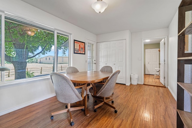 791 Springwood Ln, Kalispell, MT 59901 - dining area featuring baseboards and light wood-style flooring