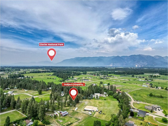 791 Springwood Ln, Kalispell, MT 59901 - aerial view of property and surrounding area featuring a mountain backdrop