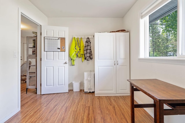 791 Springwood Ln, Kalispell, MT 59901 - kitchen featuring light wood-style flooring and white cabinets
